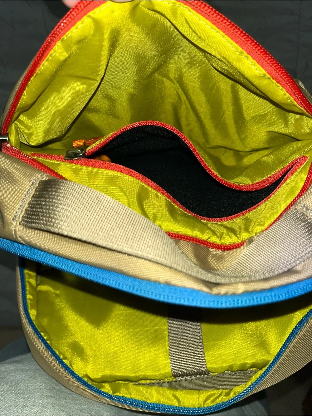 cotopaxi Tan Backpack with Blue Zipper and Multicolor Pulls
